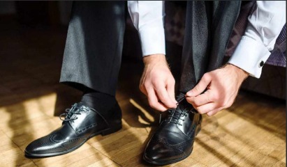 pulling shoelace through eyelet